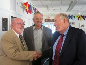 Pentwater Service Club President Bill Maxwell, State Rep. Jon Bumstead, and Roseman.