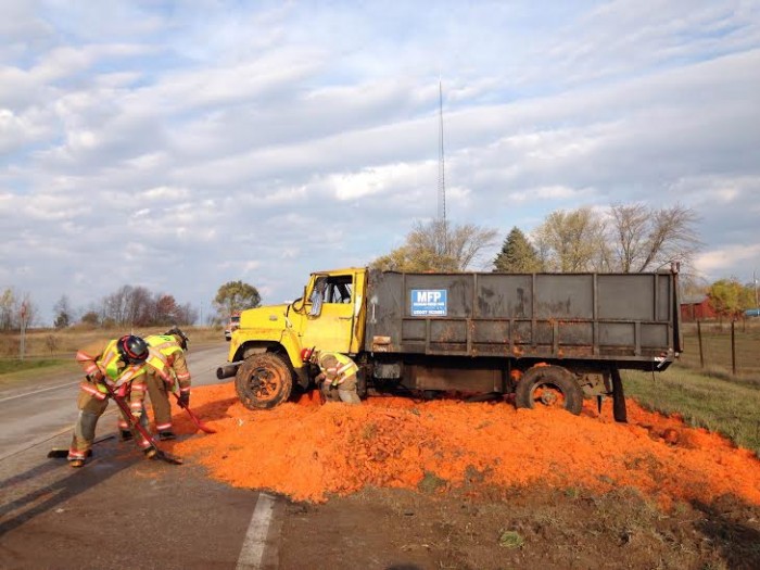 Truck flips over, spills carrots onto Oceana Drive