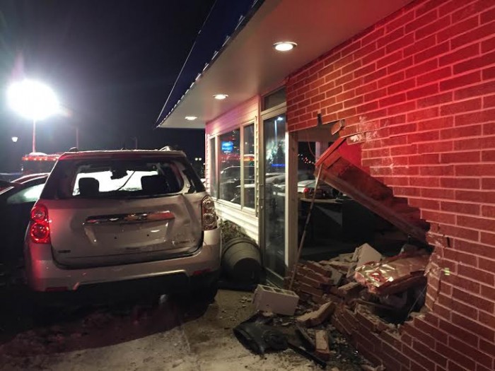 Car crashes through brick wall, smashes into 4 cars at dealership