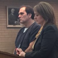 Sidney Fuller with his attorney, Julie Springstead Waltz.