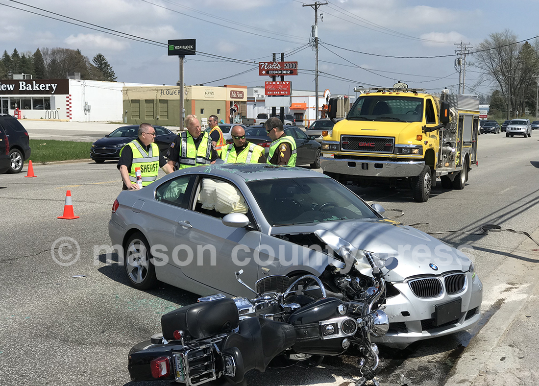 Mears woman charged in connection to US 10 crash.